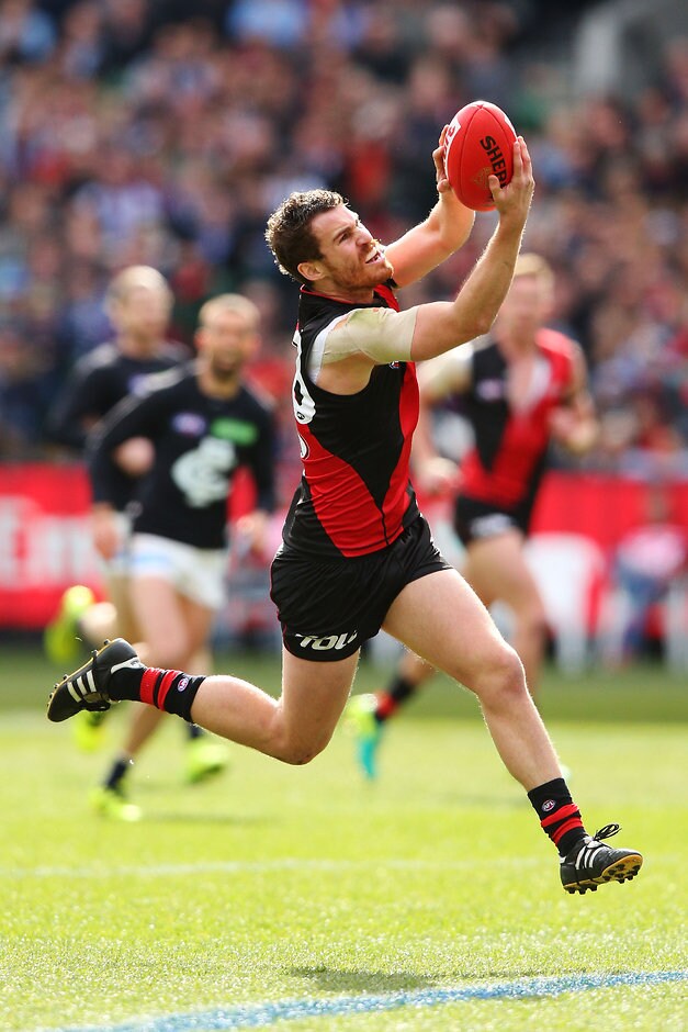 AFL 2016 Rd 23 - Essendon v Carlton MELBOURNE, AUSTRALIA - AUGUST 27: Nick Kommer of the Bombers marks the ball during the 2016 AFL Round 23 match between the Essendon Bombers and the Carlton Blues at the Melbourne Cricket Ground on August 27, 2016 in Melbourne, Australia. (Photo by Michael Dodge/AFL Media)